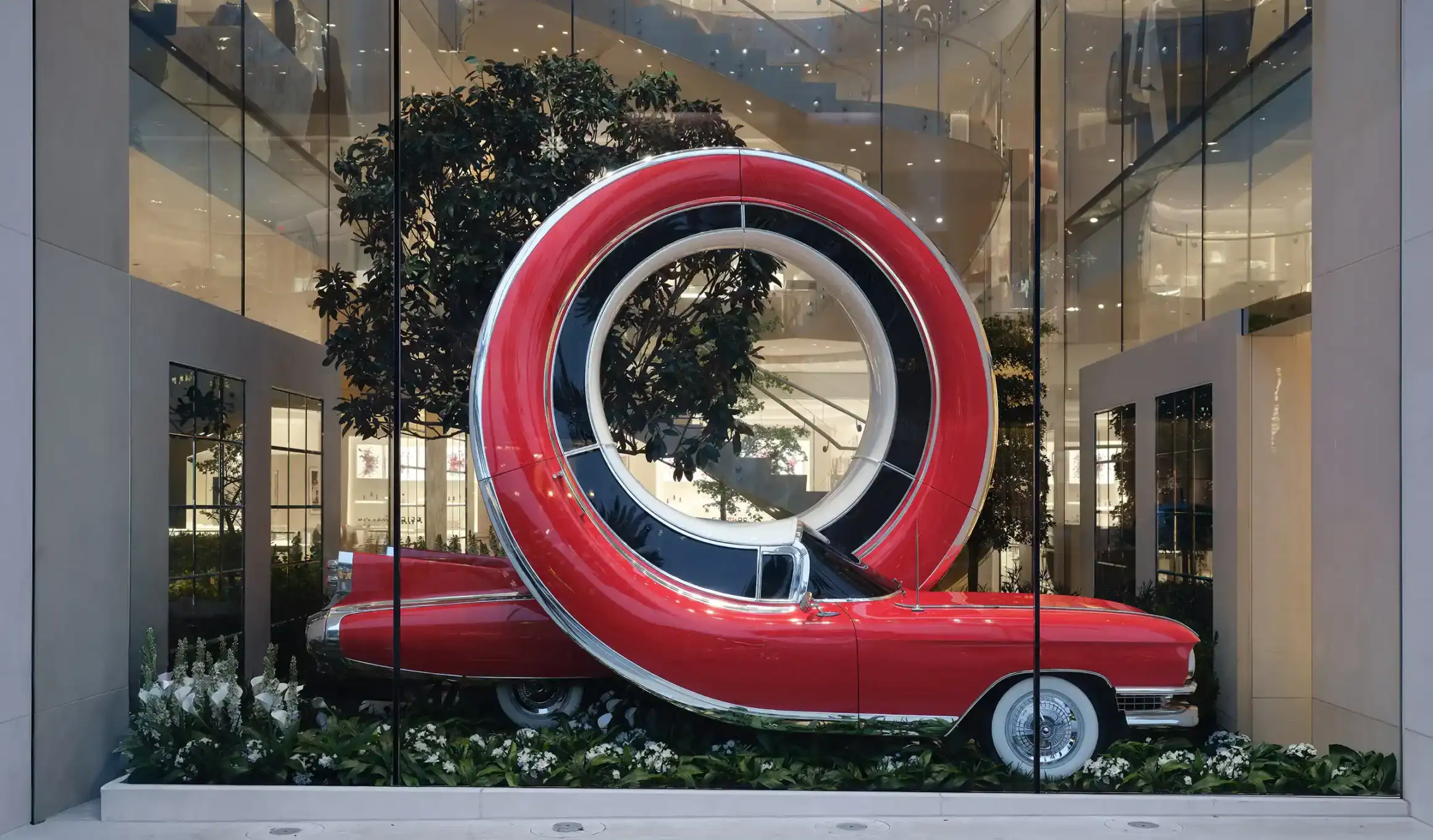 Alex Chinneck Creates Surreal Urban Sculptures for Dior Store Windows in New York and Beverly Hills